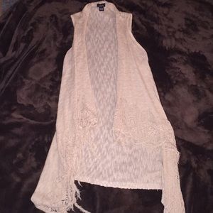 Sleeveless throw over